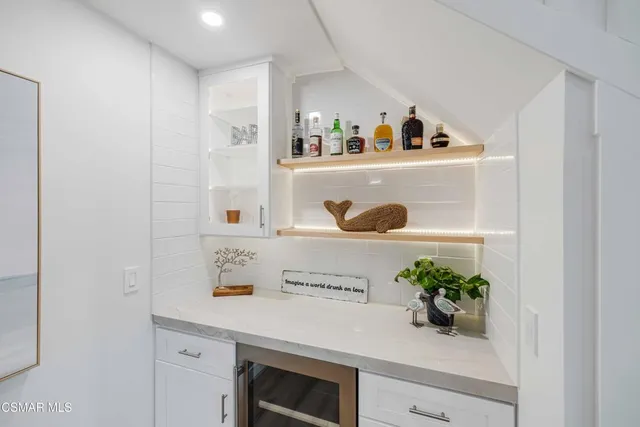 a front view of a house with a garage