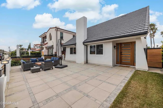 a front view of a house with garage