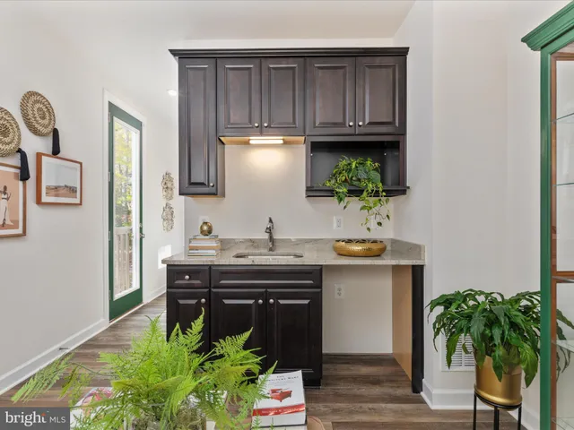 a bedroom with a bed and cabinets