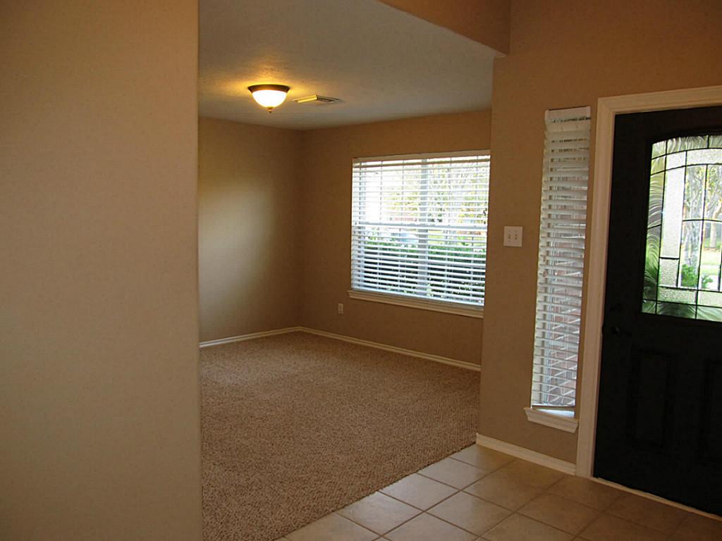 5104 Big Spring Drive Pearland, TX 77584 - Photo 3 of 28 This space can be used as study/dining or formal living