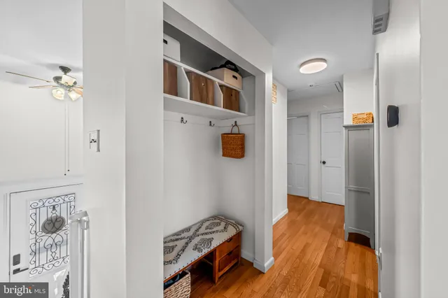 a bathroom with a tub sink toilet and mirror