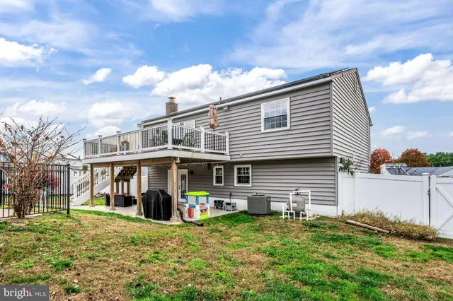 a view of swimming pool with seating space