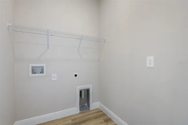 a view of small space with wooden floor