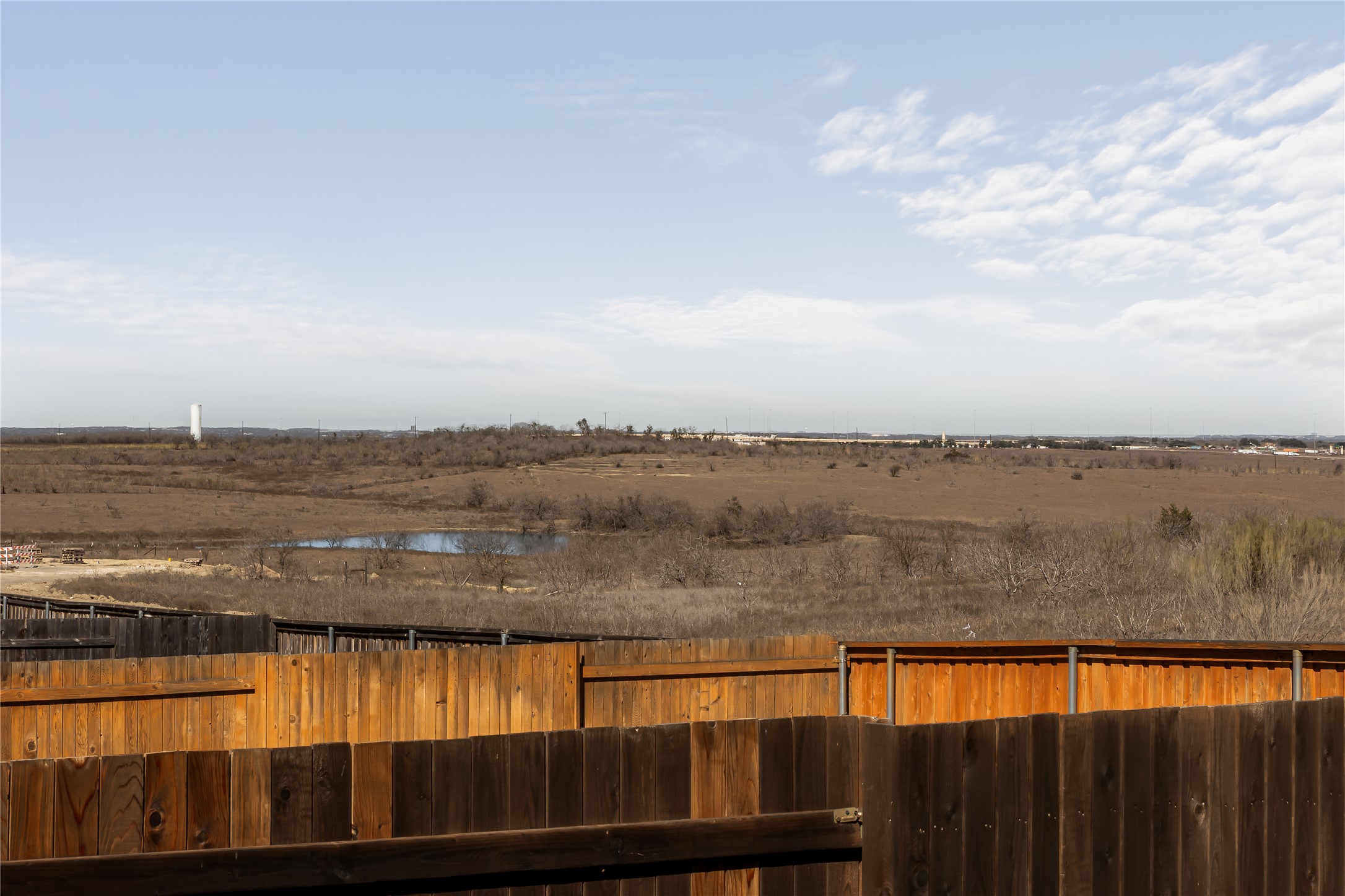 862 Pepperbark Loop Buda, TX 78610 - Photo 37 of 40 a view of outside space swimming pool and lake view