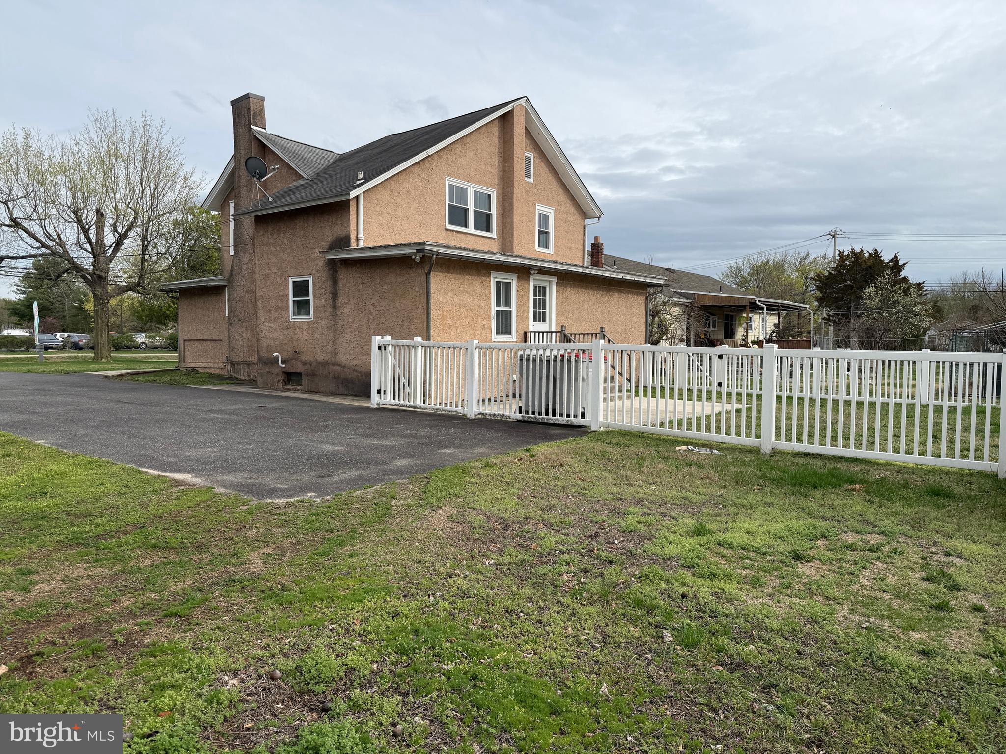 1036 South Spring Road Vineland, NJ 08361 - Photo 3 of 31 a view of a house with a yard and fence