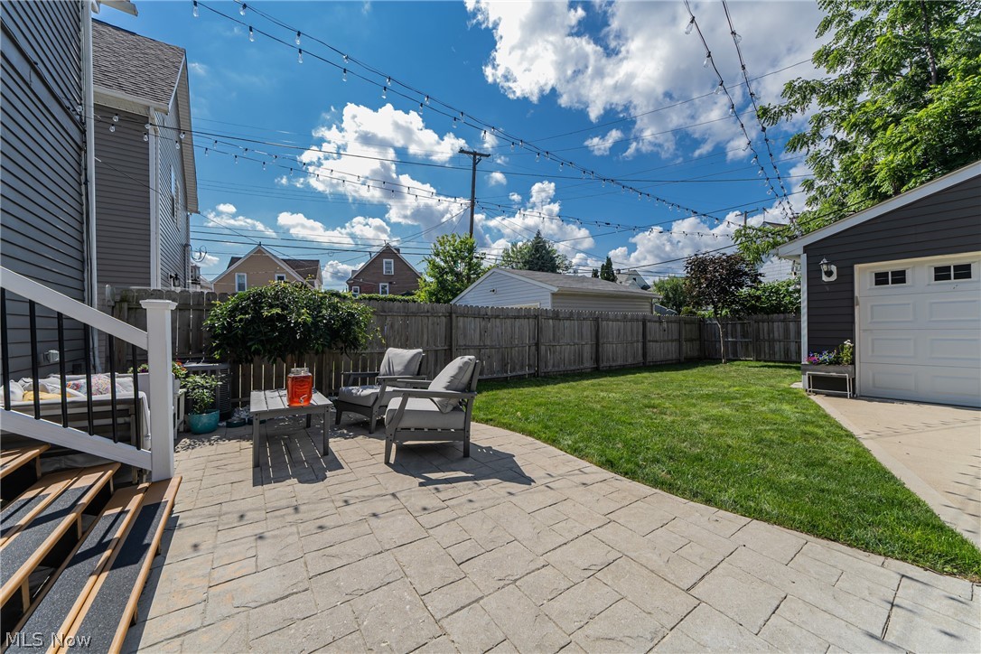 7504 Rutledge Avenue Cleveland, OH 44102 - Photo 27 of 29 Easy access from the kitchen to the paver patio