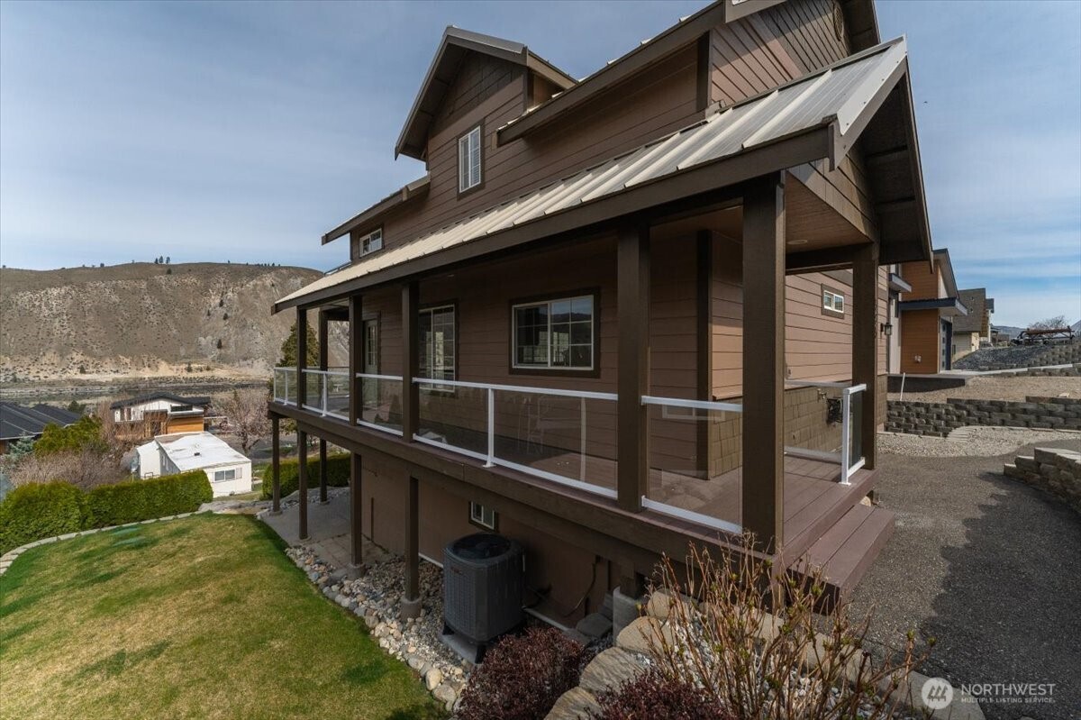 585 Entiat Place Orondo, WA 98843 - Photo 2 of 40 a balcony with an outdoor view