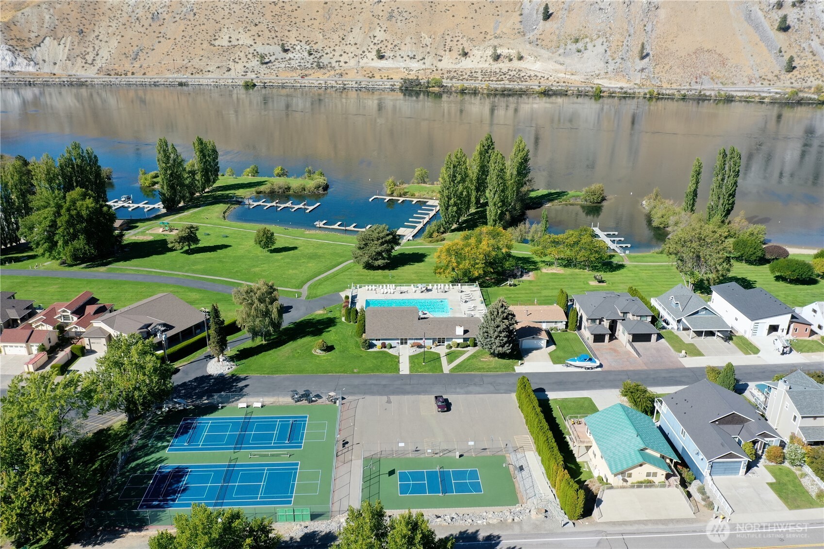 585 Entiat Place Orondo, WA 98843 - Photo 35 of 40 a view of a lake with a house