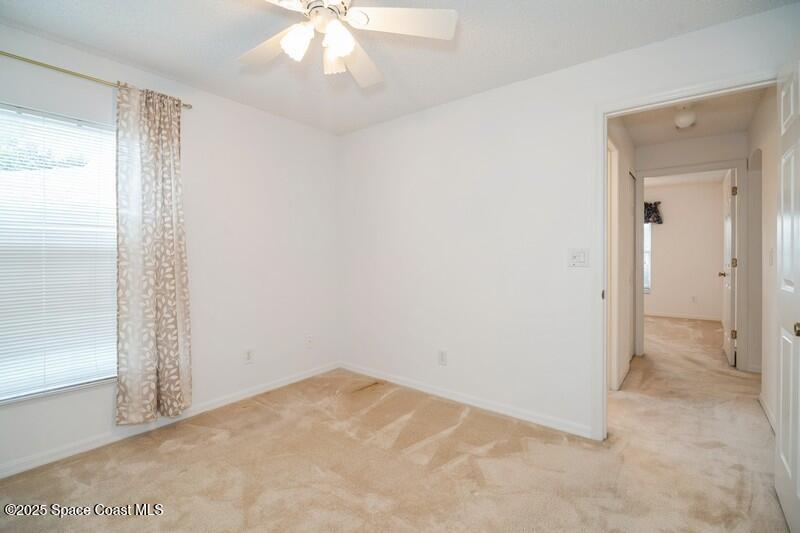 570 Benton Drive Melbourne, FL 32901 - Photo 16 of 26 an empty room with a bathroom