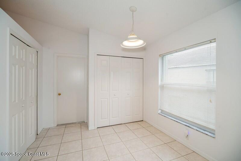 570 Benton Drive Melbourne, FL 32901 - Photo 8 of 26 a view of an empty room and window