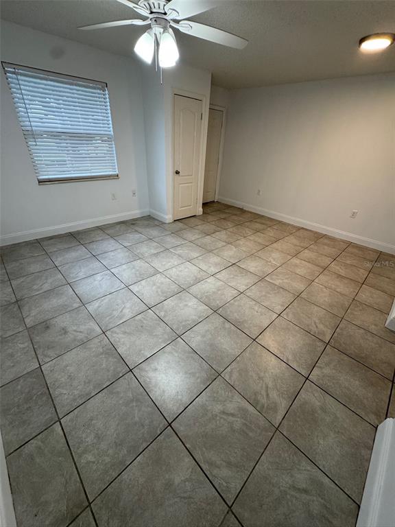 1185 Bentley Road, Unit 3 Leesburg, FL 34748 - Photo 4 of 11 a view of an empty room and window