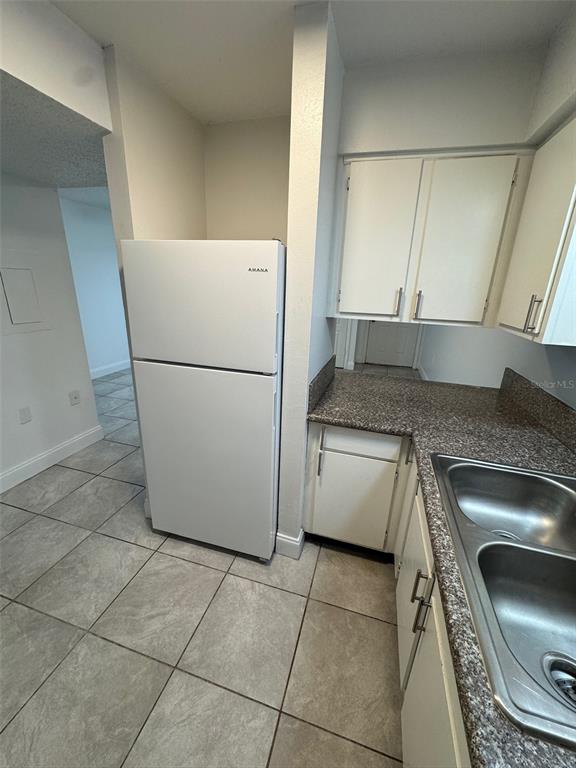 1185 Bentley Road, Unit 3 Leesburg, FL 34748 - Photo 8 of 11 a utility room with washer and dryer