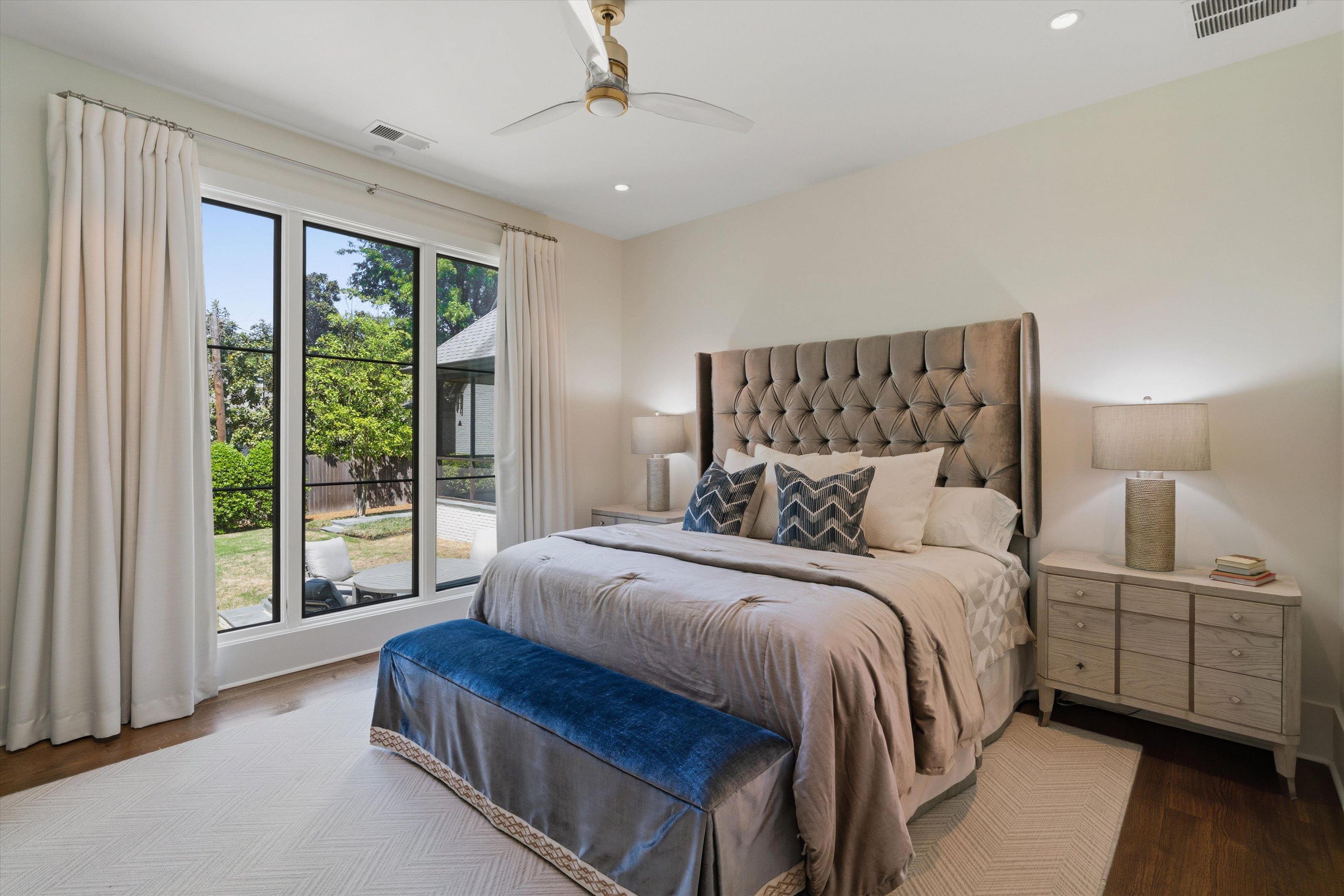 4710 Gwynne Road Memphis, TN 38117 - Photo 34 of 40 a bedroom with a bed and large window
