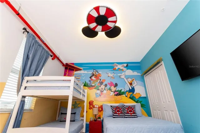 a view of a swimming pool with a lounge chair