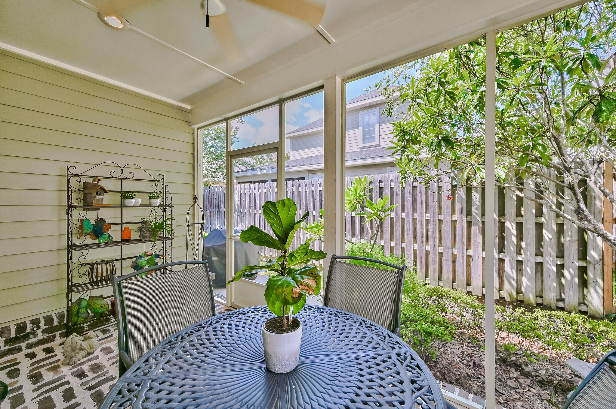 100 South Zander Way Santa Rosa Beach, FL 32459 - Photo 12 of 40 a view of a balcony with chairs and a potted plant