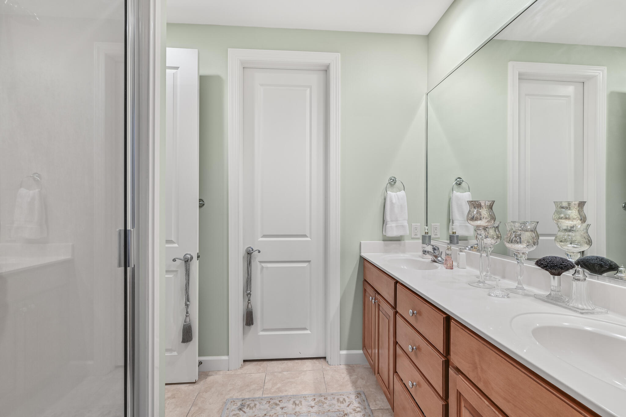 100 South Zander Way Santa Rosa Beach, FL 32459 - Photo 17 of 40 a bathroom with 2 sink and a mirror