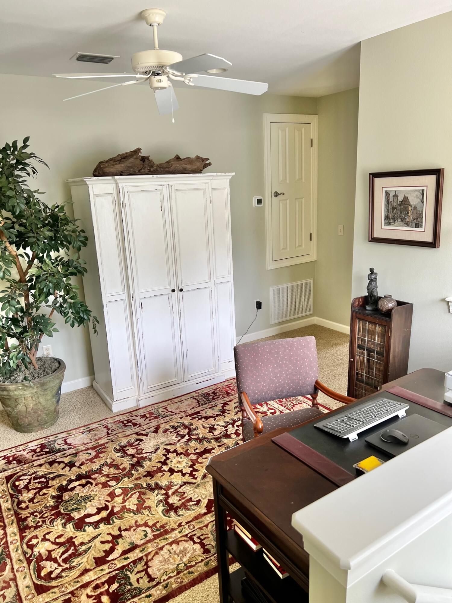 100 South Zander Way Santa Rosa Beach, FL 32459 - Photo 21 of 40 a living room with a couch