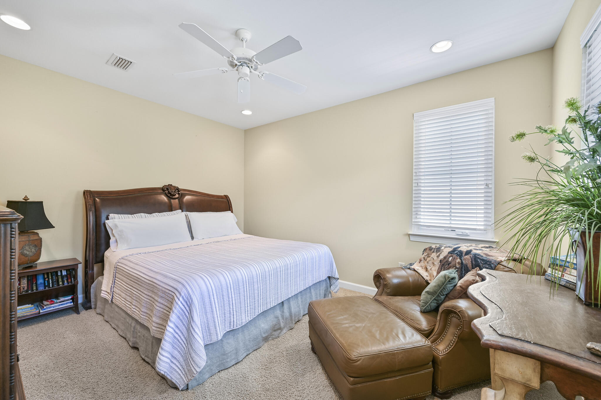 100 South Zander Way Santa Rosa Beach, FL 32459 - Photo 25 of 40 a bedroom with bed and a couch