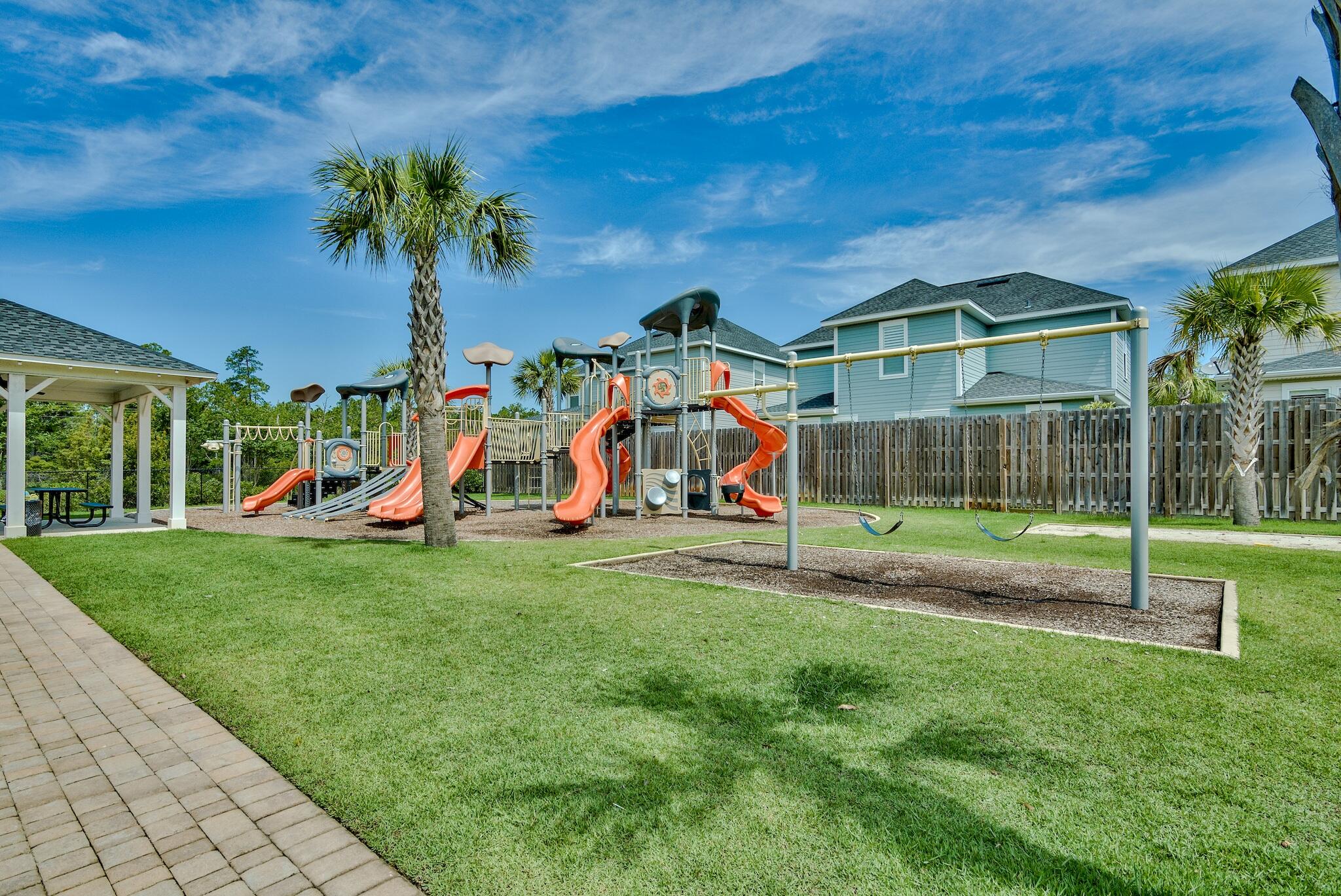 100 South Zander Way Santa Rosa Beach, FL 32459 - Photo 36 of 40 a view of a park with swings and slides