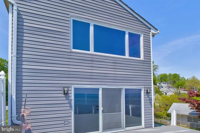 a view of a house with swimming pool