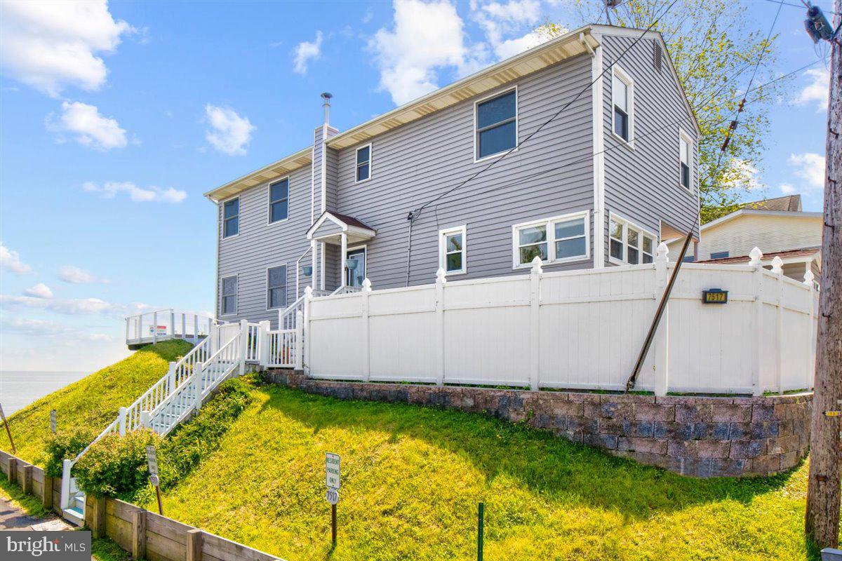 7517 B Street Chesapeake Beach, MD 20732 - Photo 28 of 78 a view of a house with swimming pool