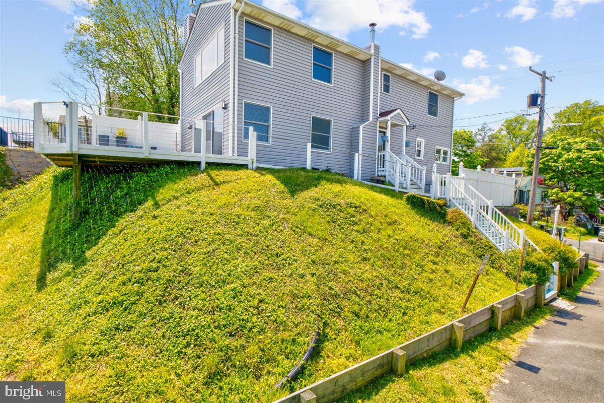 7517 B Street Chesapeake Beach, MD 20732 - Photo 29 of 78 a view of a house with a swimming pool