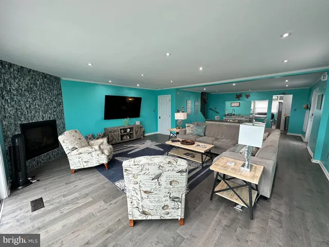 a view of a room with a large window