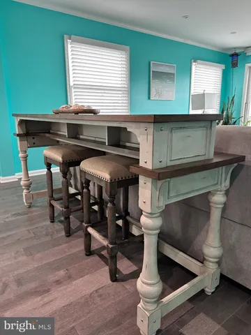 a bathroom with a sink a vanity and mirror