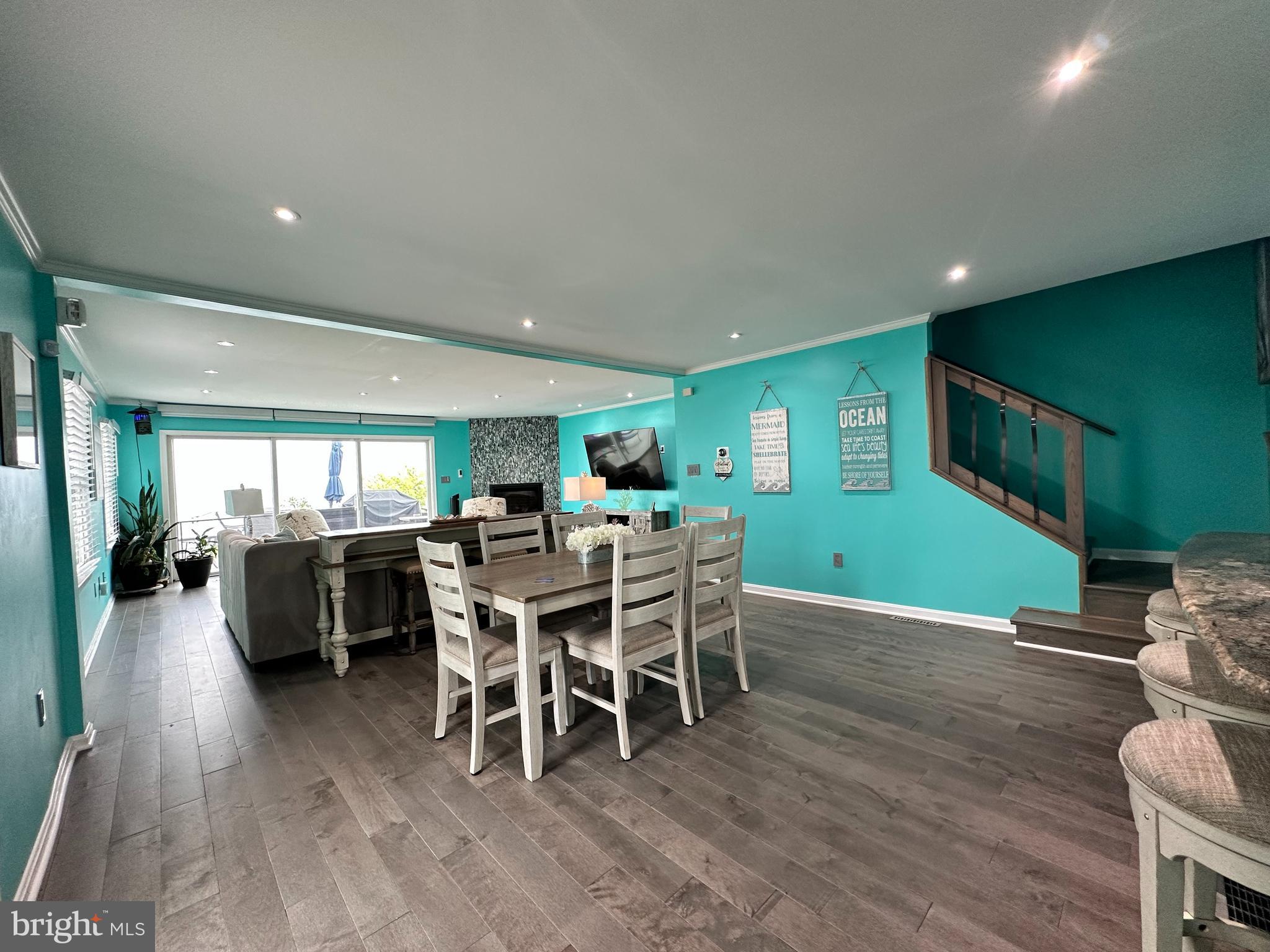 7517 B Street Chesapeake Beach, MD 20732 - Photo 43 of 78 a view of a dining room with furniture window and wooden floor