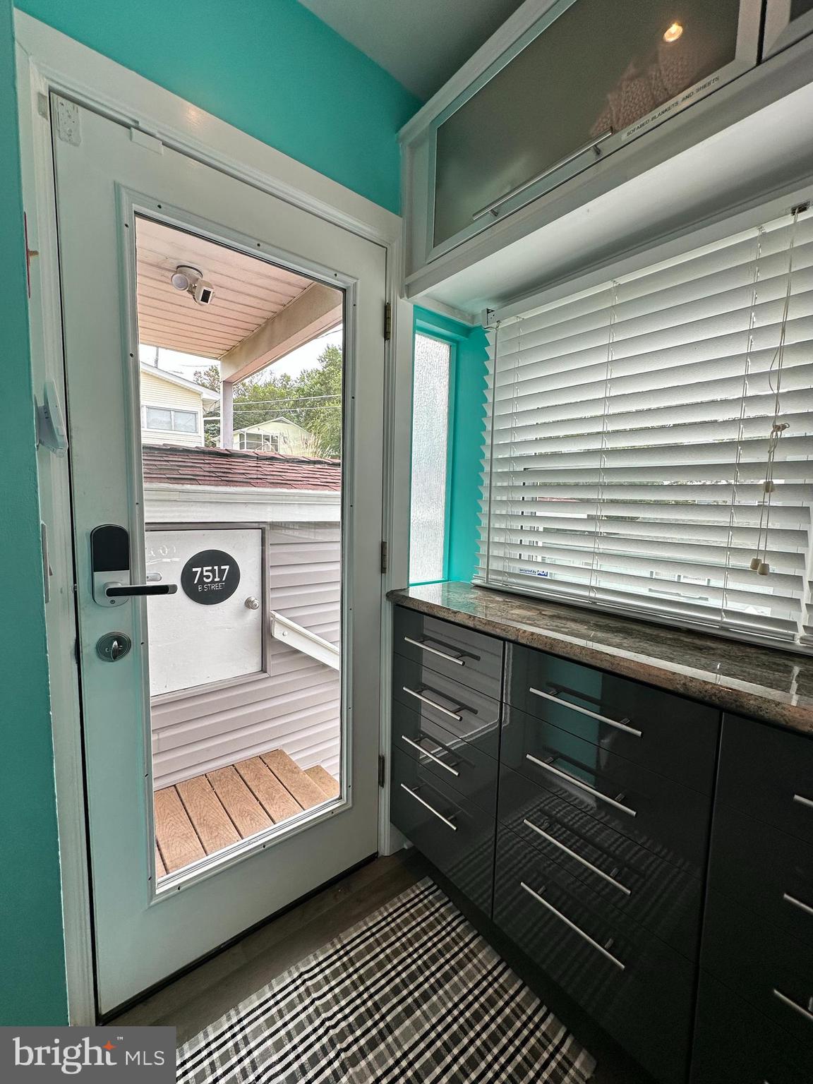 7517 B Street Chesapeake Beach, MD 20732 - Photo 49 of 78 Side door toward storage shed