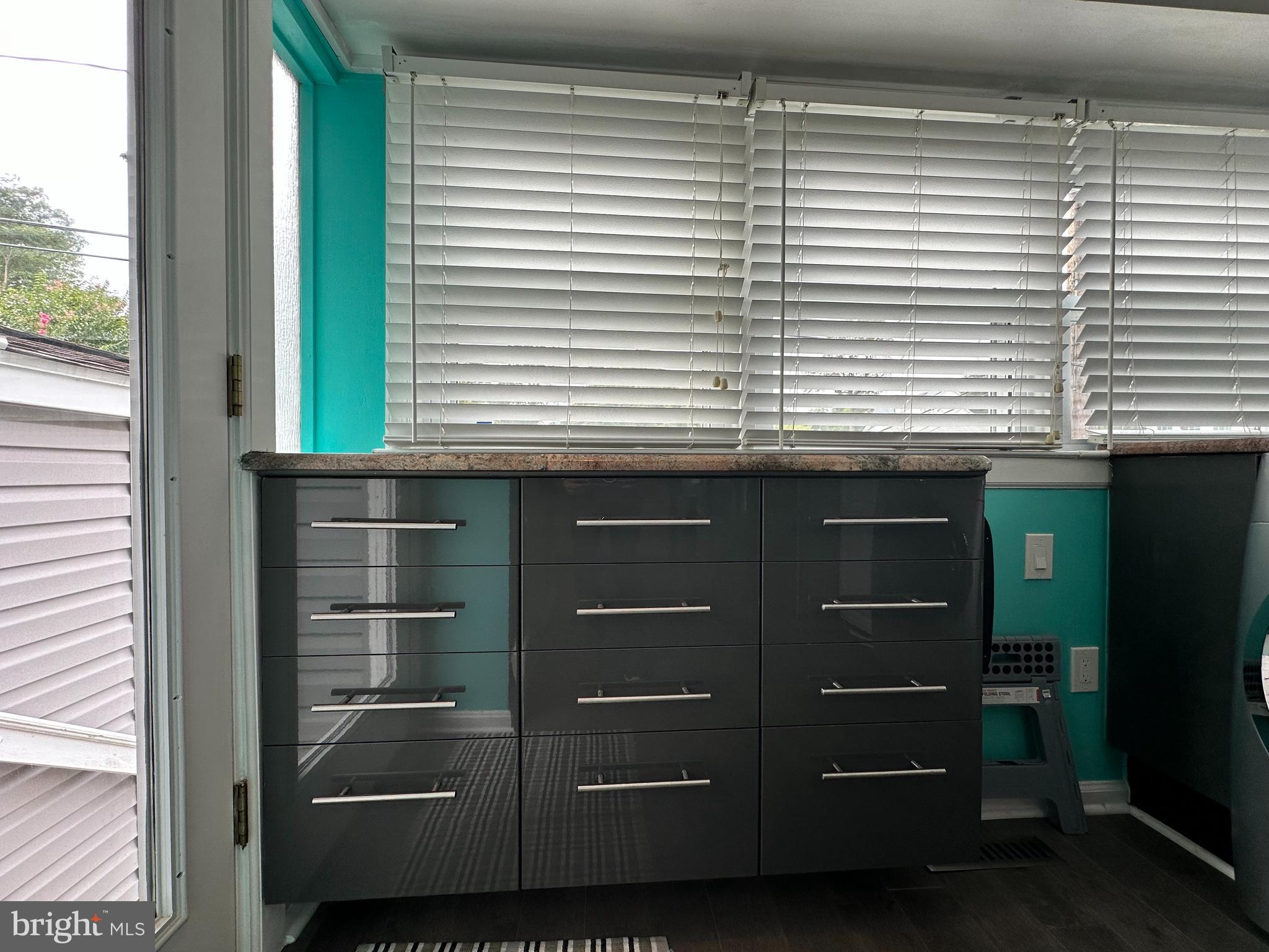 7517 B Street Chesapeake Beach, MD 20732 - Photo 50 of 78 a kitchen with a window and a sink
