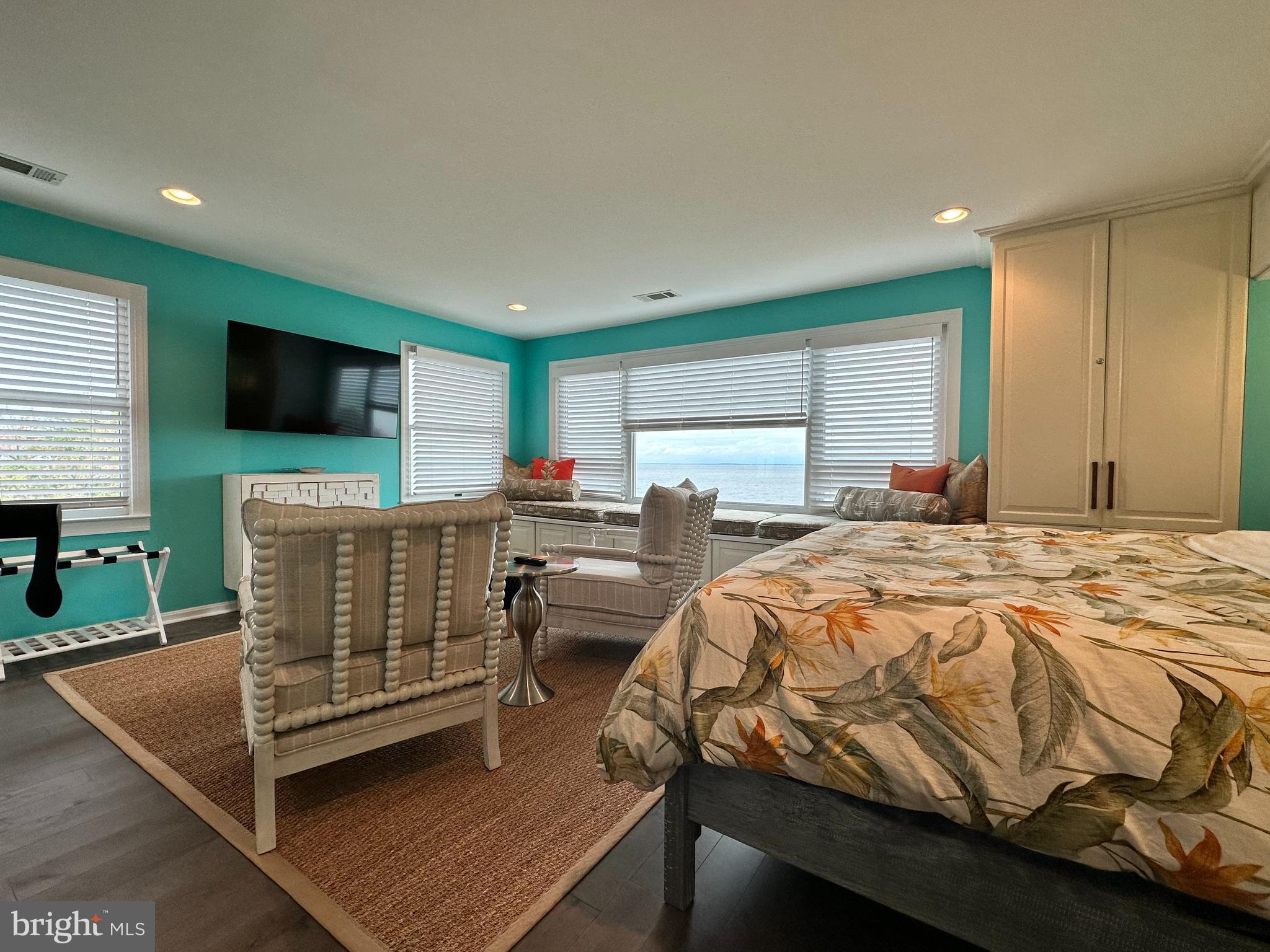 7517 B Street Chesapeake Beach, MD 20732 - Photo 57 of 78 a bedroom with a bed and a flat screen tv