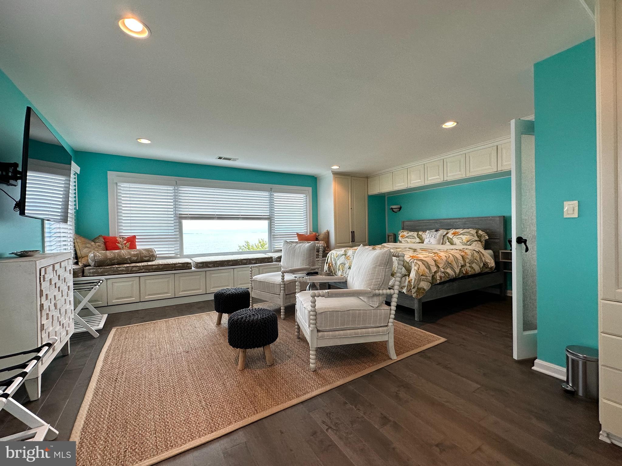 7517 B Street Chesapeake Beach, MD 20732 - Photo 58 of 78 a bedroom with furniture and a wooden floor