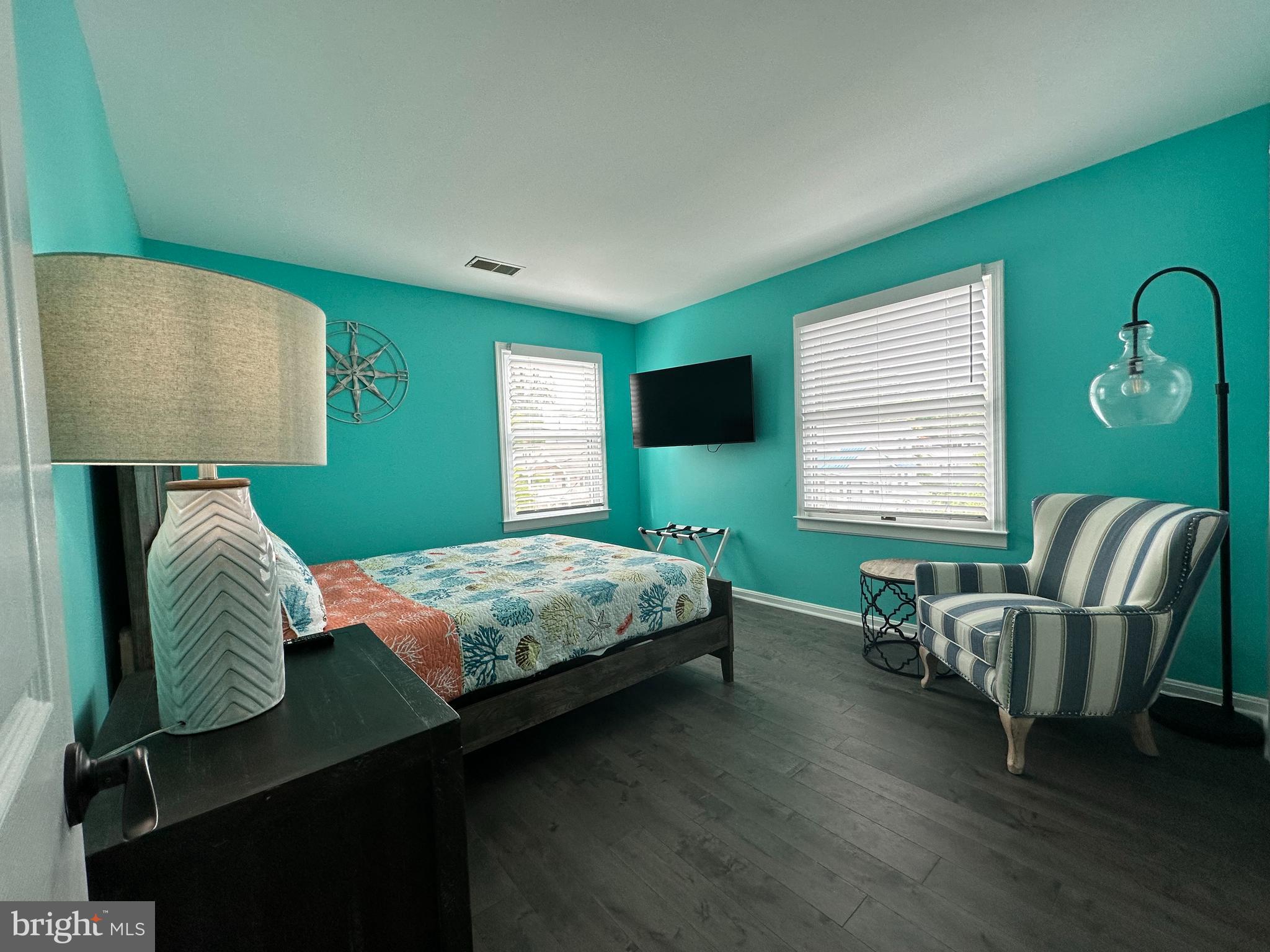 7517 B Street Chesapeake Beach, MD 20732 - Photo 70 of 78 a bedroom with a bed chair and window