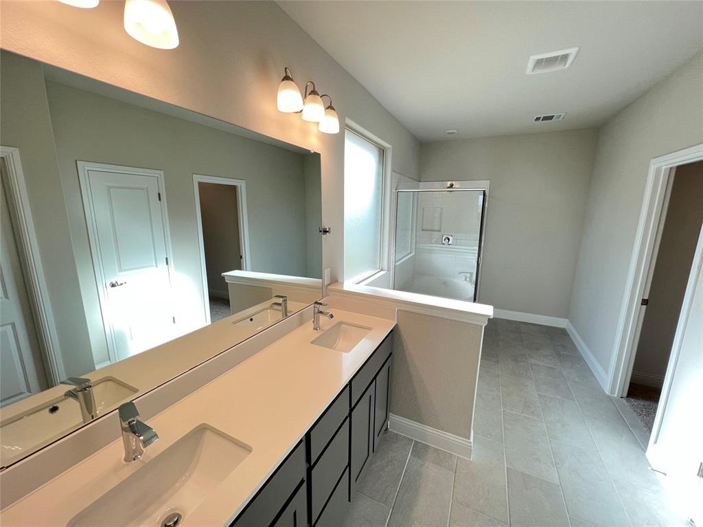 3611 Walnut Rdg Drive Midlothian, TX 76065 - Photo 17 of 29 a bathroom with a sink and a mirror