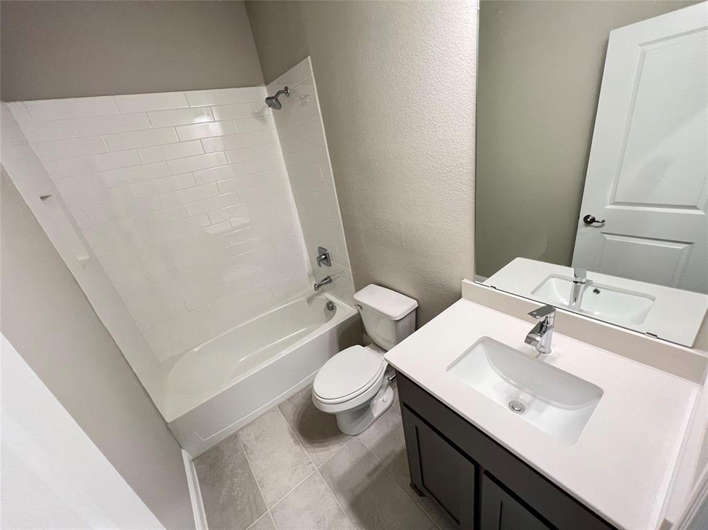 3611 Walnut Rdg Drive Midlothian, TX 76065 - Photo 24 of 29 a bathroom with a sink toilet and shower