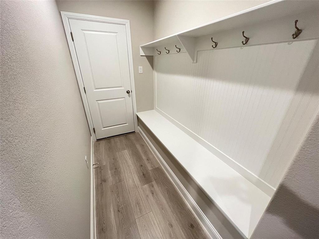 3611 Walnut Rdg Drive Midlothian, TX 76065 - Photo 25 of 29 a view of a room with wooden floor