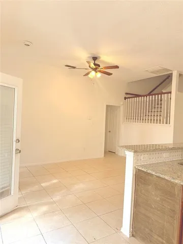 a view of a kitchen with a sink and a dishwasher