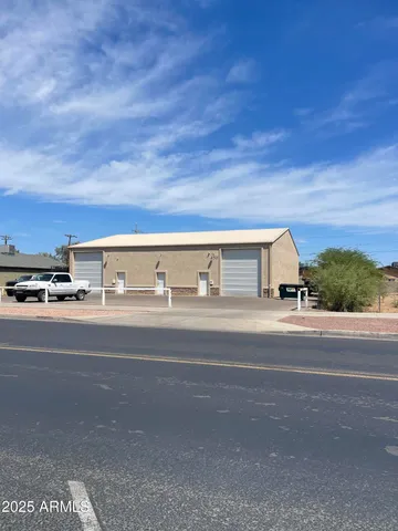a view of an ocean and trees