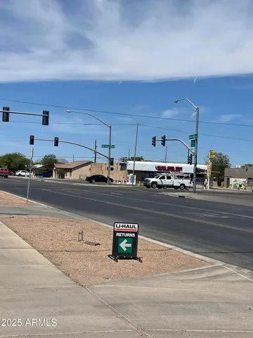 a view of a cars is parked on the road