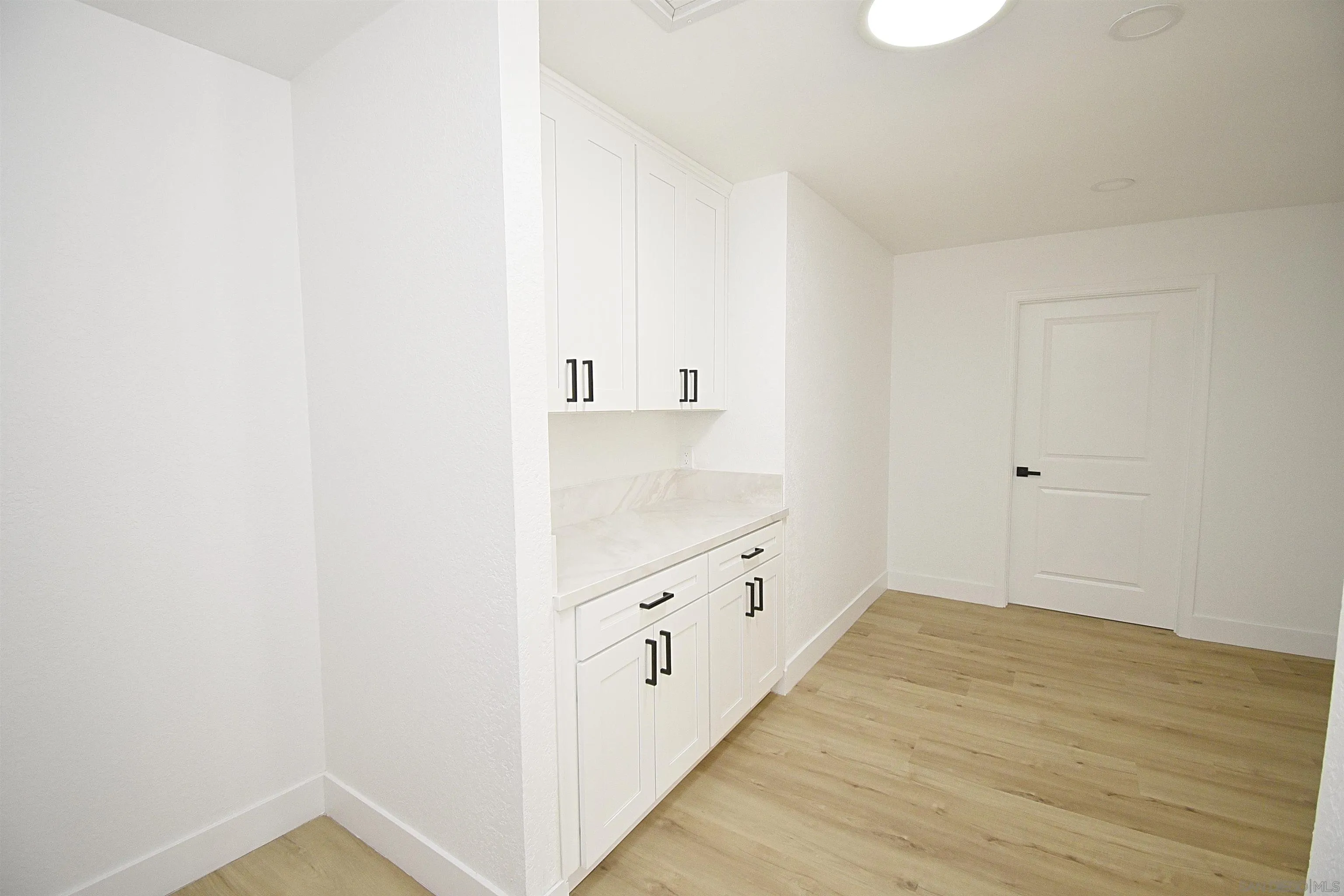 614 Sneath Way Alpine, CA 91901 - Photo 37 of 75 HALLWAY WITH STORAGE UPSTAIRS