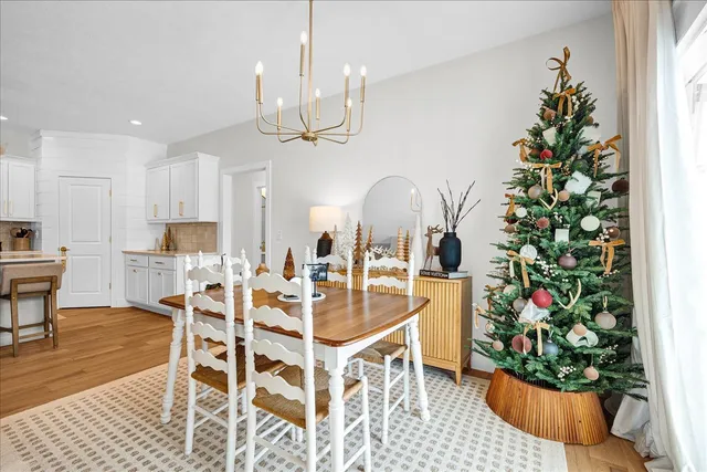 a very nice looking dining room with a table and chairs