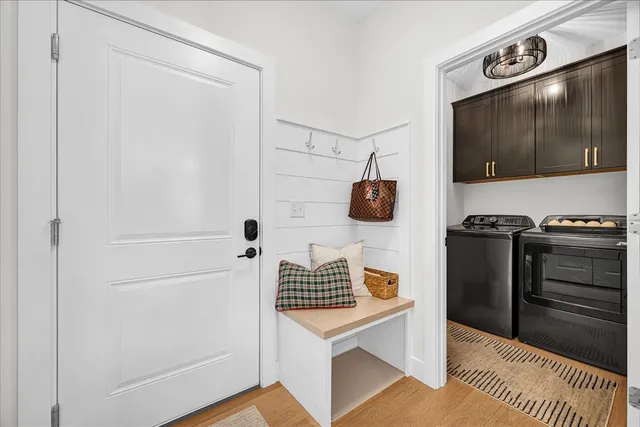 a kitchen with a refrigerator and a stove