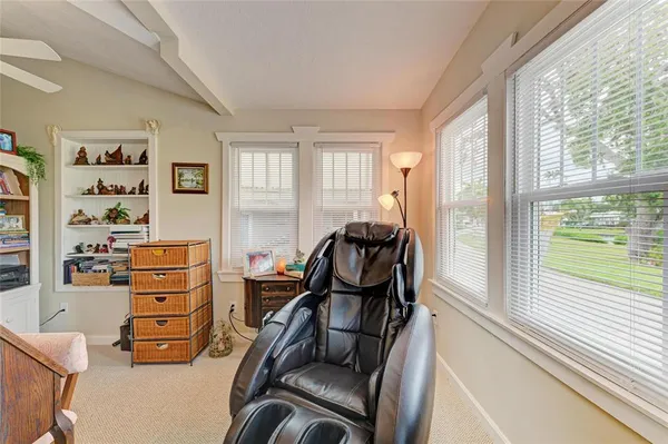 a room with furniture and wooden floor