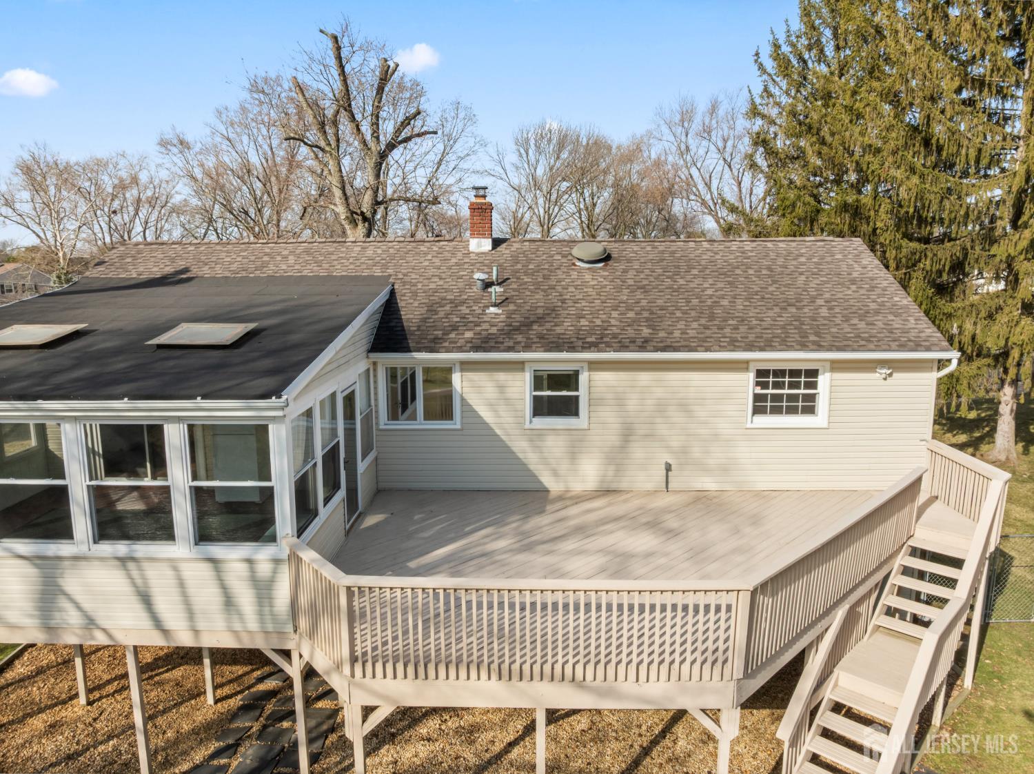 8 Tompkins Road East Brunswick, NJ 08816 - Photo 17 of 22 a view of a house with a iron gate