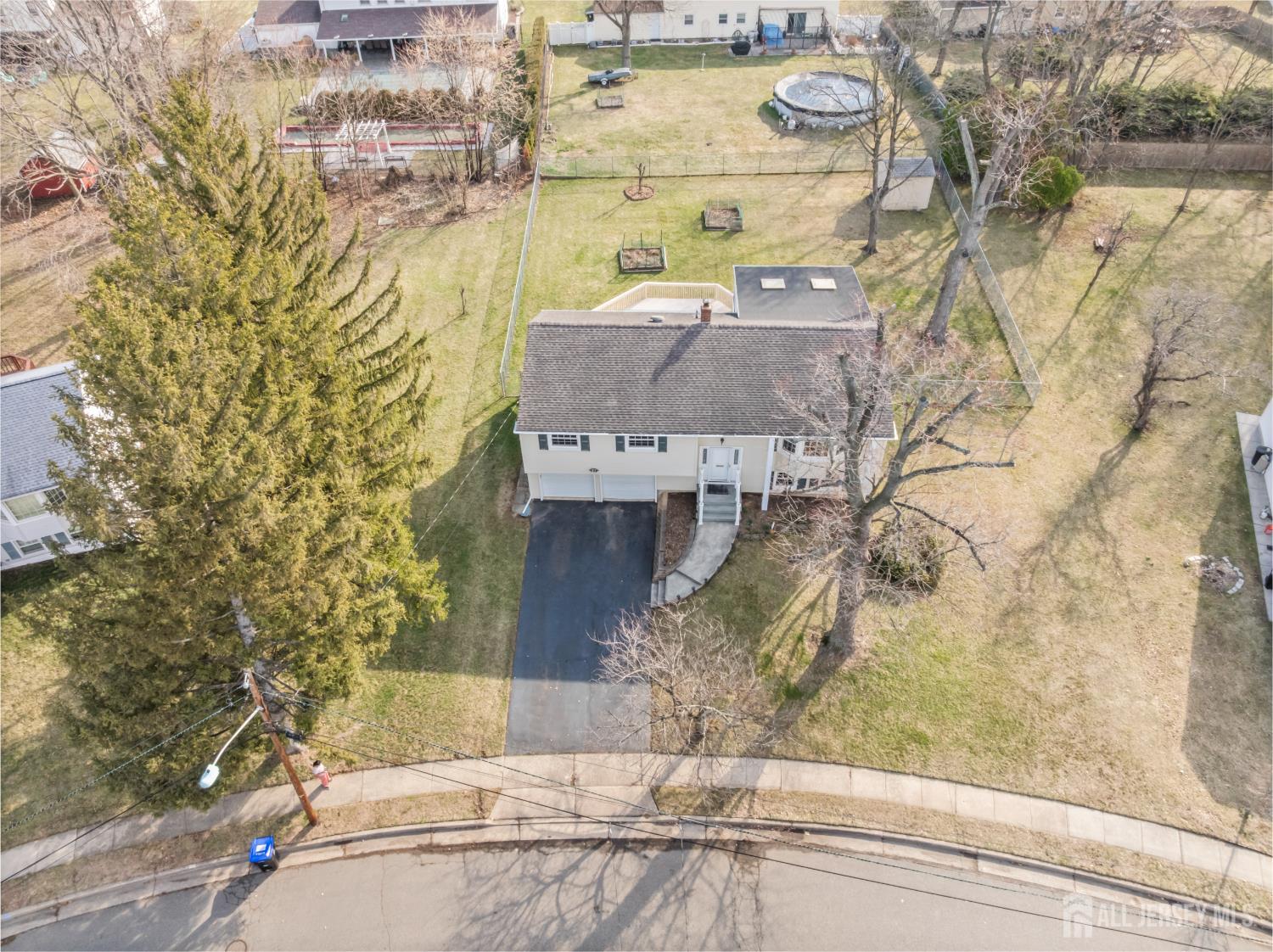 8 Tompkins Road East Brunswick, NJ 08816 - Photo 19 of 22 a view of house with backyard