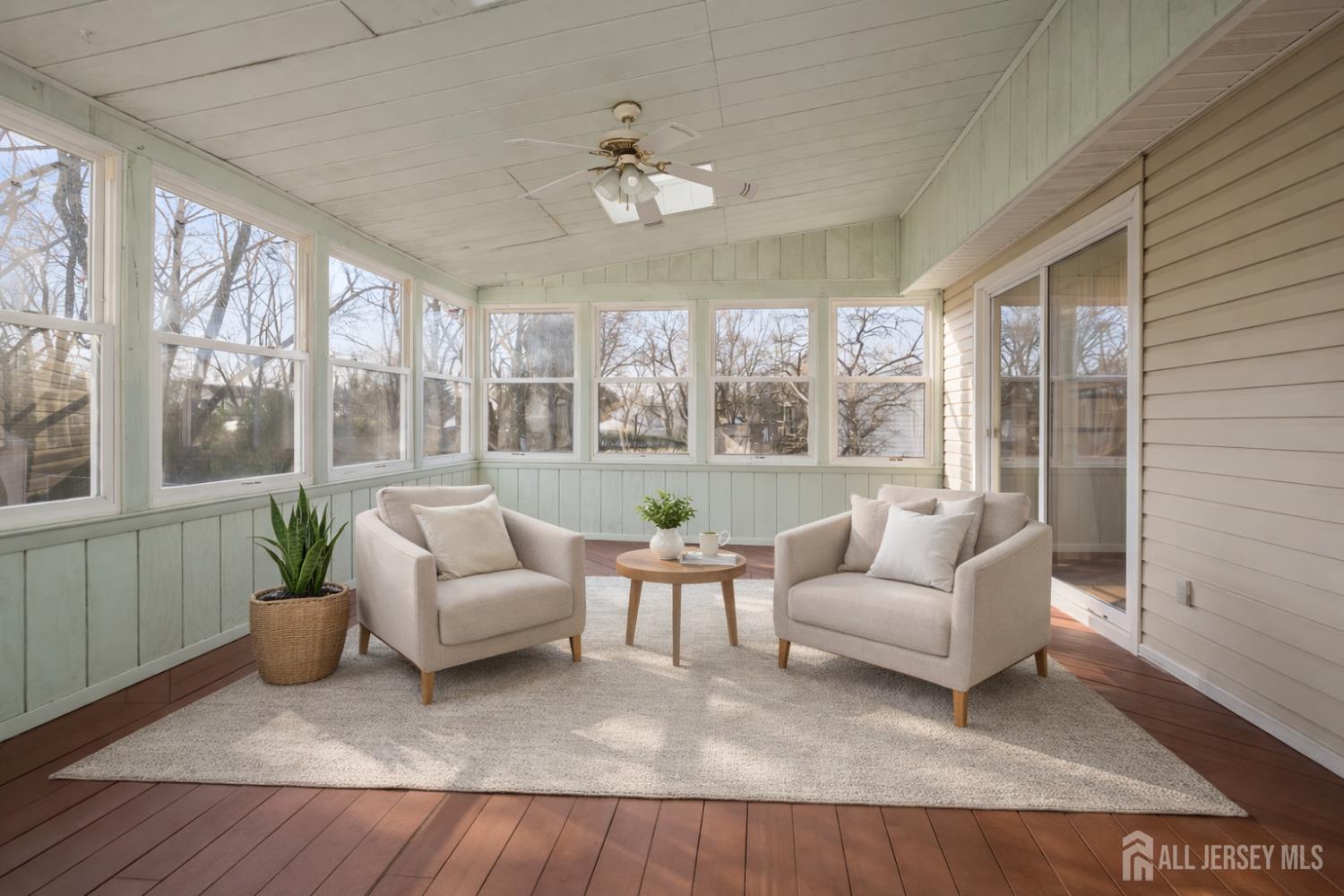 8 Tompkins Road East Brunswick, NJ 08816 - Photo 5 of 22 a living room with furniture and a large window