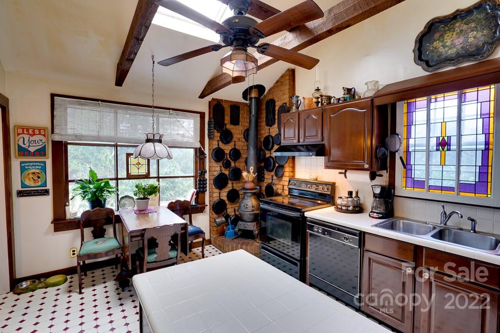 60 Mimosa Inn Drive Tryon, NC 28782 - Photo 11 of 26 a view of a kitchen and dining room