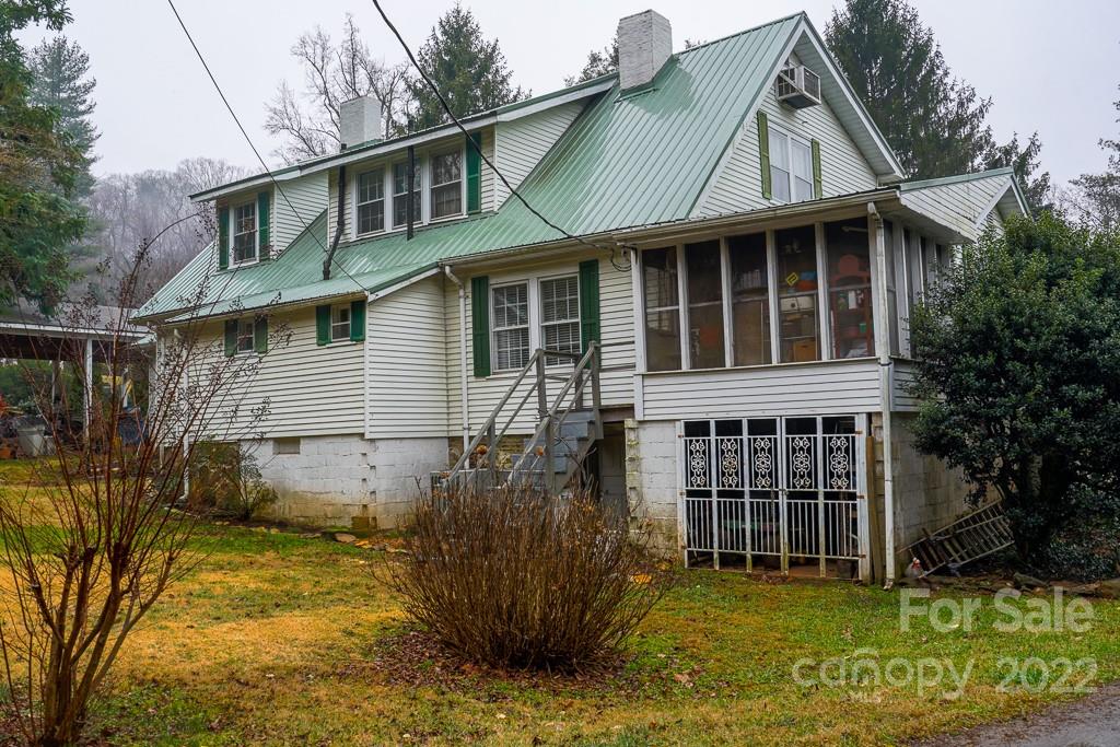 60 Mimosa Inn Drive Tryon, NC 28782 - Photo 26 of 26 a front view of a house with a yard
