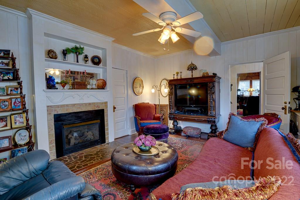 60 Mimosa Inn Drive Tryon, NC 28782 - Photo 3 of 26 a living room with furniture and a fireplace